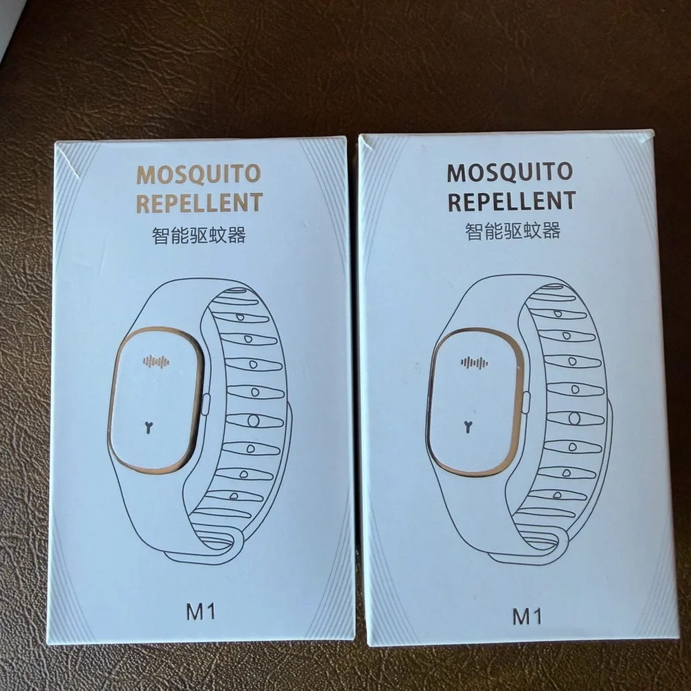 Ultrasonic Mosquito Repellent Bracelet Set of 2 Black and White, brand new